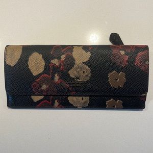 Floral print on leather coach wallet